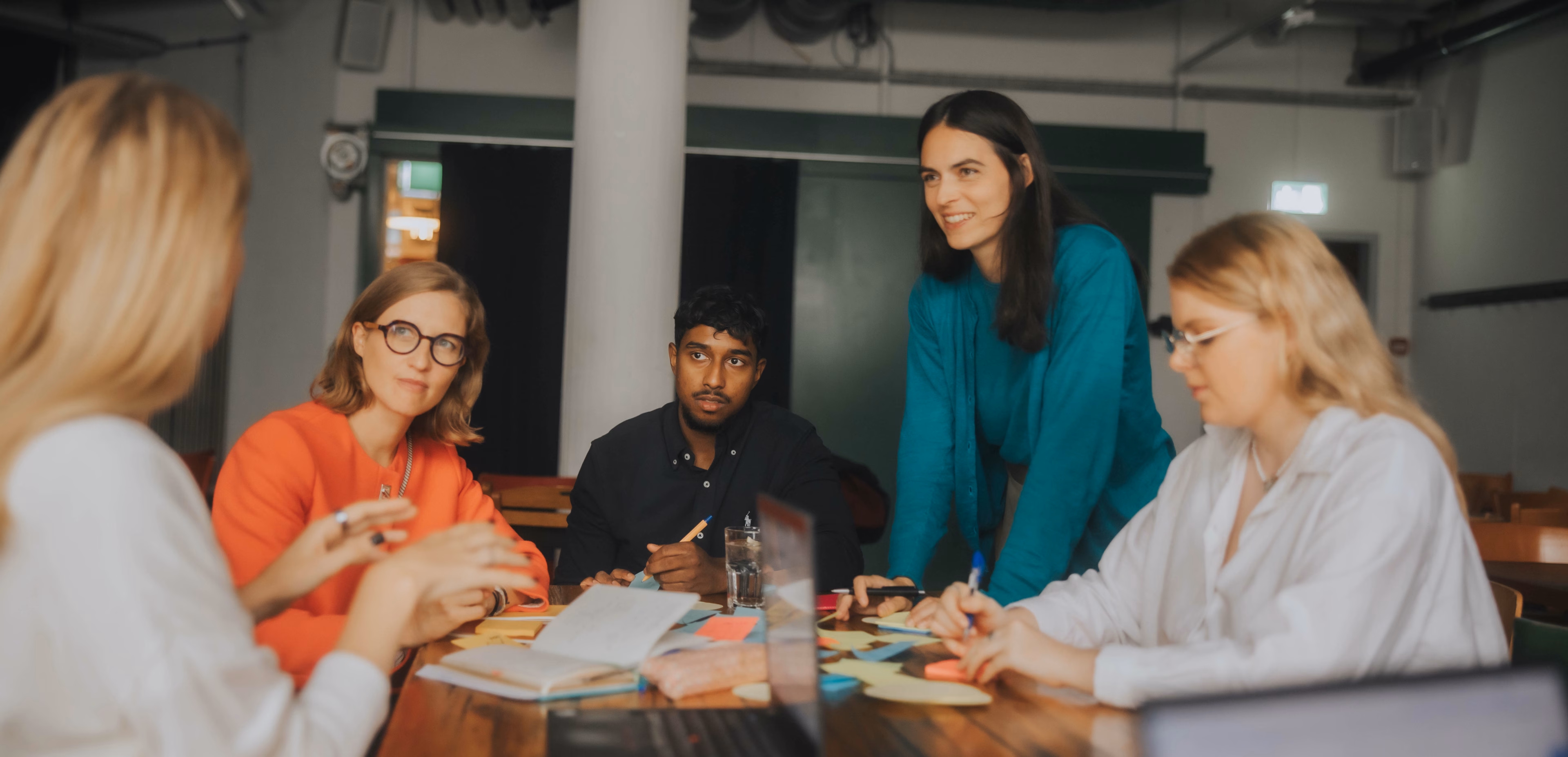People talking together in a workshop